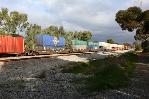 160609 0463
Woodbridge, 5PM5 intermodal train, RRZY 7008 5-pack well waggon set, the prototype of the RQZY type, first of twenty six sets built by Goninan in 1995-96 for National Rail, later rebuilt and recoded RRZY and RRZY 7049 5-pack well waggon set part of a batch of thirty two sets of RQZY type built by Goninan in 1995-96 for National Rail and also later rebuilt and recoded RRZY with double stacked loading.
Keywords: RRZY-type;RRZY7008;Goninan-NSW;RQZY-type;