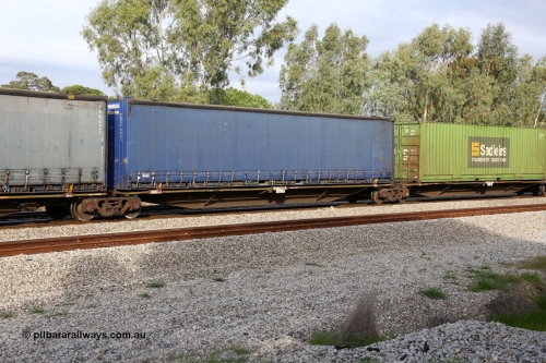 160609 0483
Woodbridge, 5PM5 intermodal train, RRAY 7180 platform 3 of 5-pack articulated skel waggon set, one of a hundred built by ABB Engineering NSW 1996-2000, 48' deck with a Pacific National 48' curtainsider PNXC 4441.
Keywords: RRAY-type;RRAY7180;ABB-Engineering-NSW;