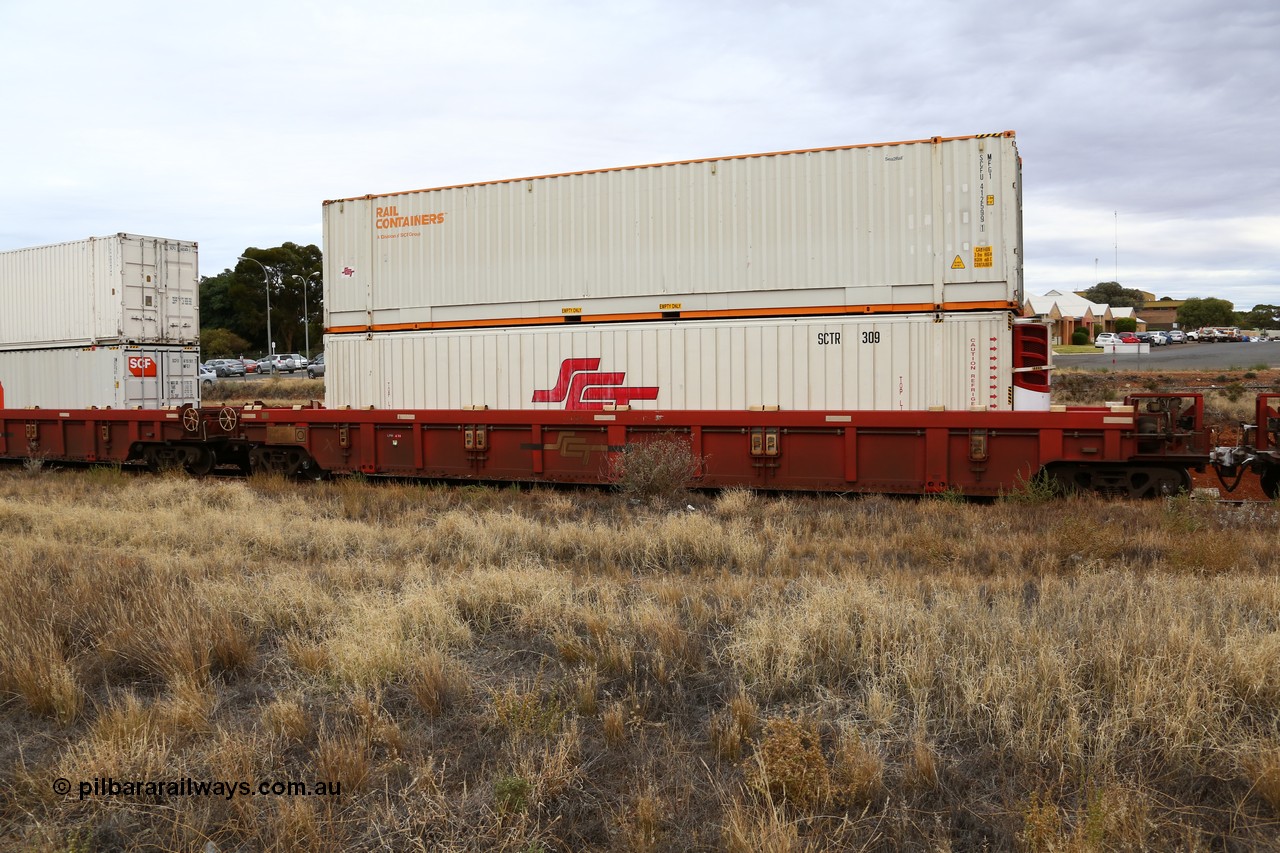 160524 3663
Kalgoorlie, SCT train 2PM9 operating from Perth to Melbourne, PWWY type PWWY 0010 one of forty well waggons built by Bradken NSW for SCT, loaded with an SCT 48' reefer SCTR 309 and a 48' MFG1 box Rail Containers SCFU 412599.
Keywords: PWWY-type;PWWY0010;Bradken-NSW;
