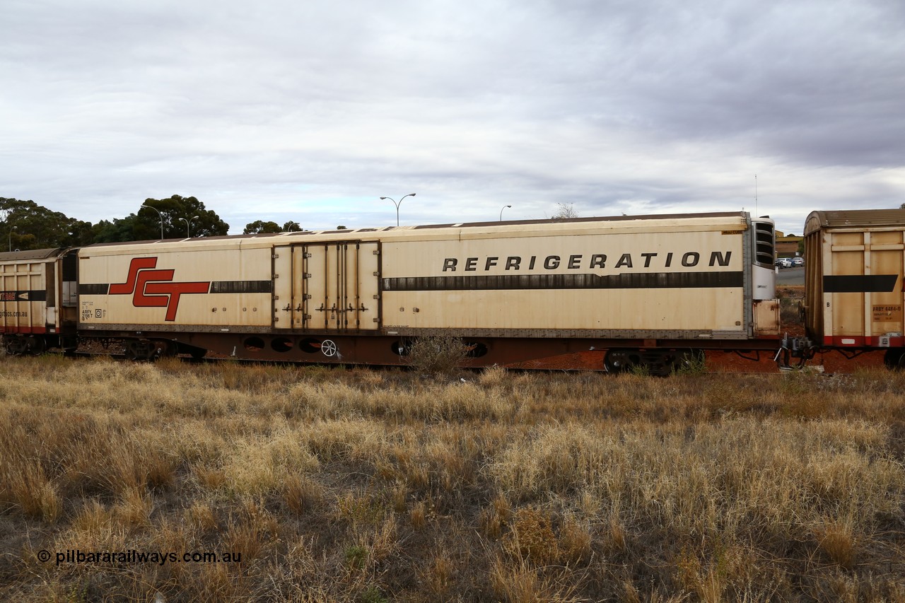 160524 3698
Kalgoorlie, SCT train 2PM9 operating from Perth to Melbourne, ARFY type ARFY 2198 refrigerated van with a Ballarat built Maxi-CUBE body mounted on an original Commonwealth Railways ROX container waggon built by Comeng Qld in 1970, recoded to AQOX, AQOY and RQOY before having the Maxi-CUBE refrigerated body added circa 1998 for SCT service.
Keywords: ARFY-type;ARFY2198;Maxi-Cube;Comeng-Qld;ROX-type;AQOX-type;