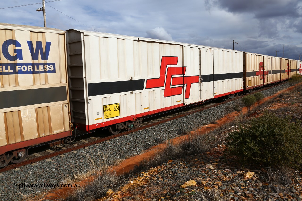 160526 5300
West Kalgoorlie, SCT train 3MP9 operating from Melbourne to Perth, PBHY type covered van PBHY 0068 Greater Freighter, built by CSR Meishan Rolling Stock Co China in 2014 without the Greater Freighter signage.
Keywords: PBHY-type;PBHY0068;CSR-Meishan-China;