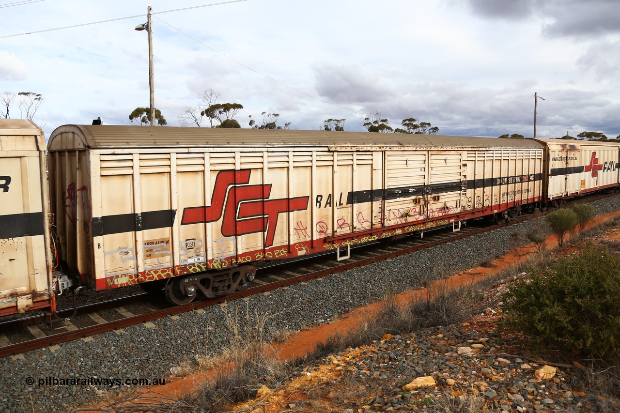 160526 5342
West Kalgoorlie, SCT train 3MP9 operating from Melbourne to Perth, ABSY type van ABSY 4499, one of a batch of fifty made by Comeng WA as VFX type 75' covered vans 1977, recoded to ABFX type, seen here with the silver corrugated roof fitted when Gemco WA upgraded it to ABSY type.
Keywords: ABSY-type;ABSY4499;Comeng-WA;VFX-type;ABFX-type;