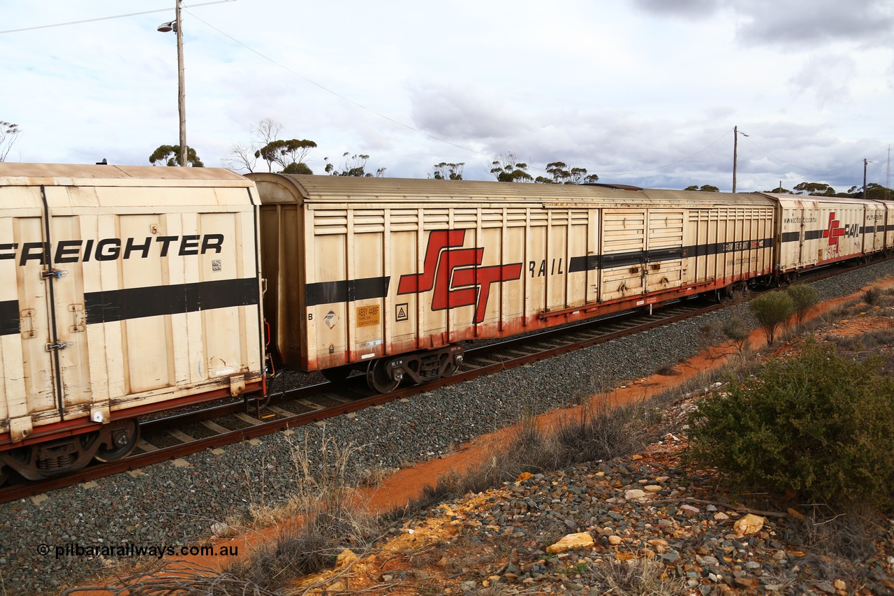 160526 5352
West Kalgoorlie, SCT train 3MP9 operating from Melbourne to Perth, ABSY type van ABSY 4488, one of a batch of fifty made by Comeng WA as VFX type 75' covered vans 1977, recoded to ABFX type, when Gemco WA upgraded it to ABSY type, seen here with the silver corrugated roof fitted and the centre loading roof hatch.
Keywords: ABSY-type;ABSY4488;Comeng-WA;VFX-type;ABFX-type;