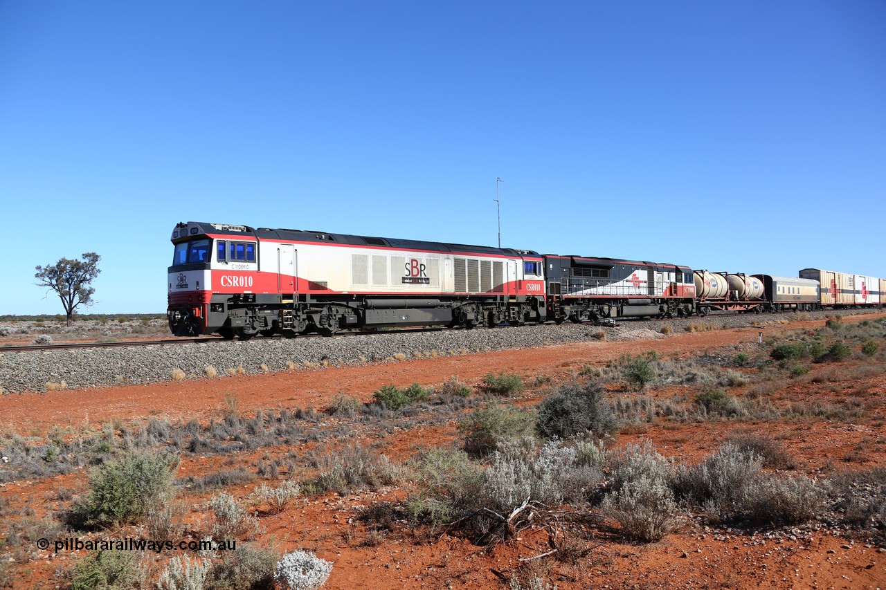 160527 5523
Blamey crossing loop at the 1692 km, SCT train 5PM9 operating from Perth to Melbourne speeds through behind CSR Ziyang Locomotive Co, China SDA1 model SCT CSR class locomotive CSR 010 'C Mobrici' and SCT 008 with 71 waggons for 4117.5 tonnes and 1752.5 metres.
Keywords: CSR-class;CSR-010;CSR-Ziyang-China;SDA1;