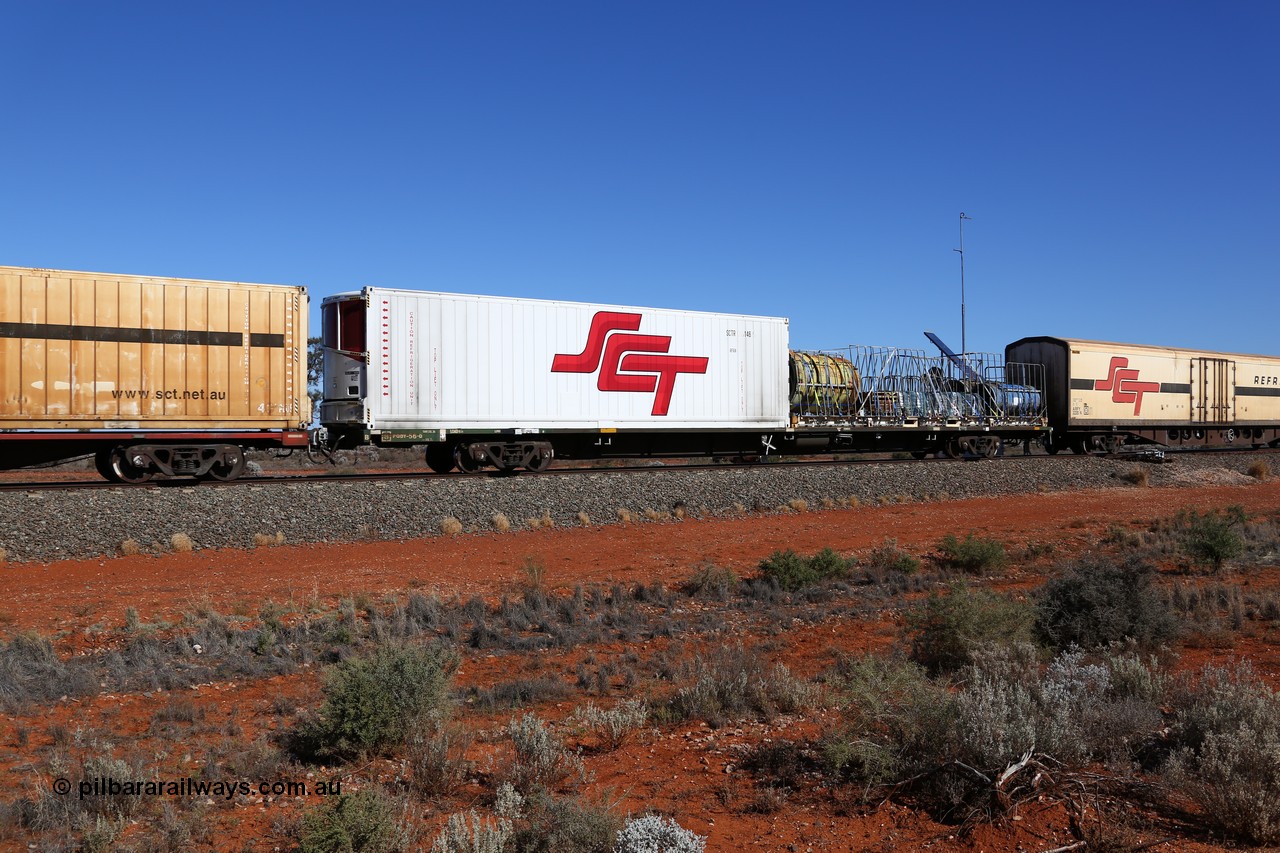 160527 5549
Blamey crossing loop at the 1692 km, SCT train 5PM9 operating from Perth to Melbourne, originally built by V/Line's Bendigo Workshops in June 1986 as one of fifty VQDW type 'Jumbo' Container Flat waggons built, PQDY 56 still in Freight Australia green livery loaded with an SCT 40' reefer SCTR 146 and a former Macfield 40' flat rack MGCU loaded with underground vent fans.
Keywords: PQDY-type;PQDY56;Victorian-Railways-Bendigo-WS;VQDW-type;