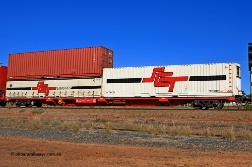 100603 8979
Parkeston, SCT train 3MP9, PQIY type 80' container flat PQIY 0010, one of forty units built by Gemco WA in 2009 loaded with an SCT 40' reefer SCTR 025 [old code FC?? 96501?? visible] and a Macfield 40' box MGCU 600219[5] [original code 40219 visible] double stacked with an SCT 40' curtainsider SCT 1029.
Keywords: PQIY-type;PQIY0010;Gemco-WA;