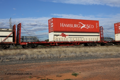 130710 1010
Parkeston, SCT train 3PG1 operating from Perth to Melbourne, PQCY 824 was originally built by Victorian Railways Newport Workshops in 1973 as one of four hundred and twenty five FQX type 60' 3TEU container flat waggons, it was recoded to VQCX before private ownership and reclassed PQCY type. PQCY 824 is now fitted with bulkheads and here loaded its own gates, and an SCT half height curtain sider 40' container SCT 1004 double stacked with Hamburg Sud 40' 45G1 type container HASU 411182.
Keywords: PQCY-type;PQCY824;Victorian-Railways-Newport-WS;FQX-type;VQCX-type;