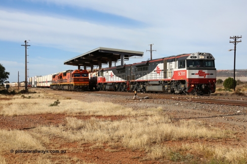160523 2867
Parkeston, SCT train 7GP1 which operates from Parkes NSW (Goobang Junction) to Perth, SCT class SCT 011 serial 07-1735 lead unit is an EDI Downer built EMD model GT46C-ACe, departs with 70 waggons for 5231 tonnes and 1647.5 metres length.
Keywords: SCT-class;SCT011;EDI-Downer;EMD;GT46C-ACe;07-1735;