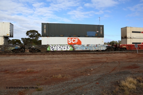 160525 4573
Parkeston, SCT train 3PG1 which operates from Perth to Parkes NSW (Goobang Junction), CFCLA lease CQWY type well waggon set CQWY 5038-1 with two 48' MFG1 boxes SCF box SCFU 415201 and Royal Wolf unit RWTU 922042 both with SCT decals. The CQWY was built by Bluebird Rail Operations in South Australia in 2008 as a batch of sixty pairs.
Keywords: CQWY-type;CQWY5038;CFCLA;Bluebird-Rail-Operations-SA;