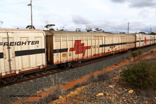 160526 5352
West Kalgoorlie, SCT train 3MP9 operating from Melbourne to Perth, ABSY type van ABSY 4488, one of a batch of fifty made by Comeng WA as VFX type 75' covered vans 1977, recoded to ABFX type, when Gemco WA upgraded it to ABSY type, seen here with the silver corrugated roof fitted and the centre loading roof hatch.
Keywords: ABSY-type;ABSY4488;Comeng-WA;VFX-type;ABFX-type;