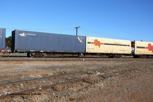 160530 9140
Parkeston, SCT train 1PM9 operates mostly empty from Perth to Melbourne, originally built by Victorian Railways Newport Workshops in 1975 as one of twenty five FCF type 'Jumbo' Container Flat waggons built, PQDY 22 still in Freight Australia green livery loaded with a 40' 4EG1 type Cronos box CXSU 105843 and an SCT 40' reefer SCTR 009 with former code FQRU 402008 visible.
Keywords: PQDY-type;PQDY22;Victorian-Railways-Newport-WS;FCF-type;FCW-type;VQDW-type;