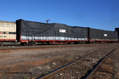 160530 9181
Parkeston, SCT train 7GP1 which operates from Parkes NSW (Goobang Junction) to Perth, PQCY 824 was originally built by Victorian Railways Newport Workshops in 1973 as one of one hundred and twenty five FQX type 60' 3TEU container flat waggons, it was recoded to VQCX before private ownership and reclassed PQCY type, PQCY 824 is now fitted with bulkheads and here loaded with timber products.
Keywords: PQCY-type;PQCY824;Victorian-Railways-Newport-WS;FQX-type;VQCX-type;