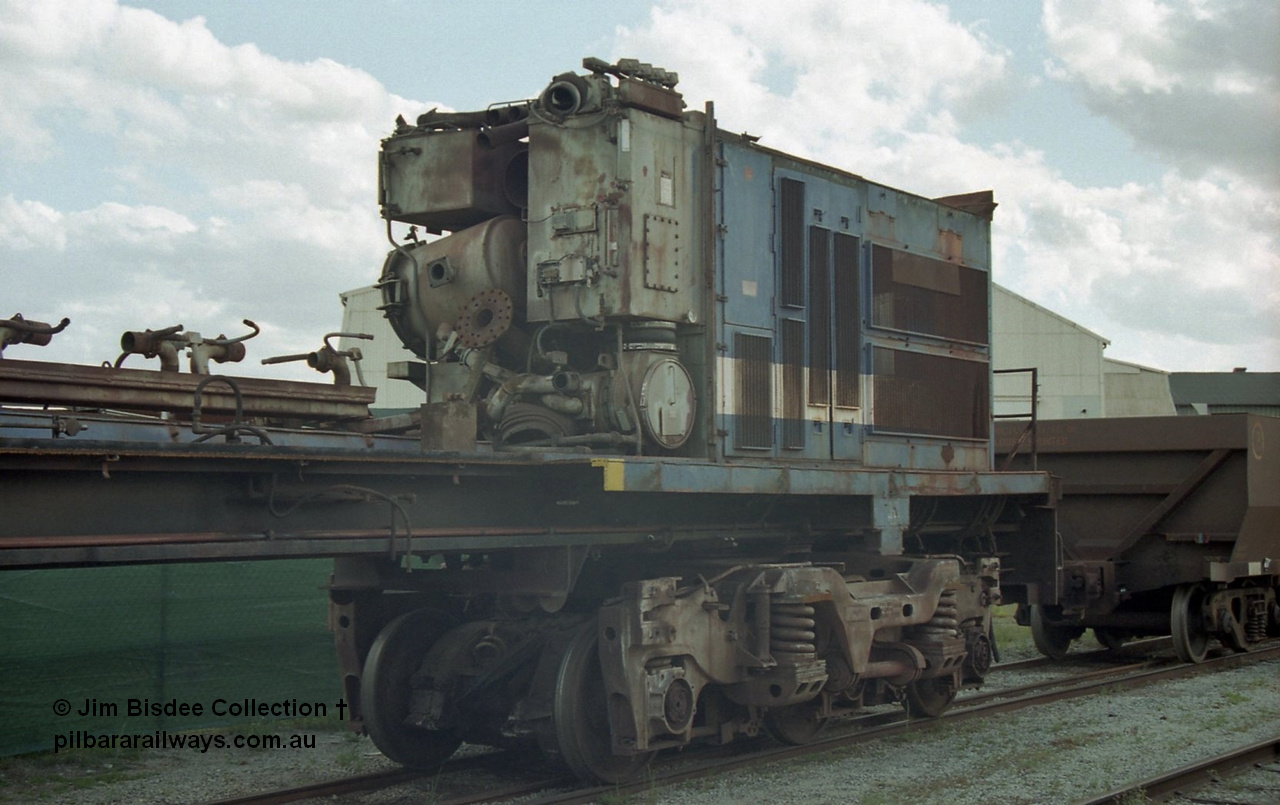 19799
Bassendean, Goninan workshops, former BHP Iron Ore Goninan GE rebuild C36-7M unit 5509, seen here stripped down to being an engine test bed, view of the radiator section with the lube filter and cooler visible on the no. 2 end. Sept 2003.
Jim Bisdee photo.
Keywords: 5509;Goninan;GE;C36-7M;4839-05/87-074;rebuild;AE-Goodwin;ALCo;C636;5452;G6012-1;