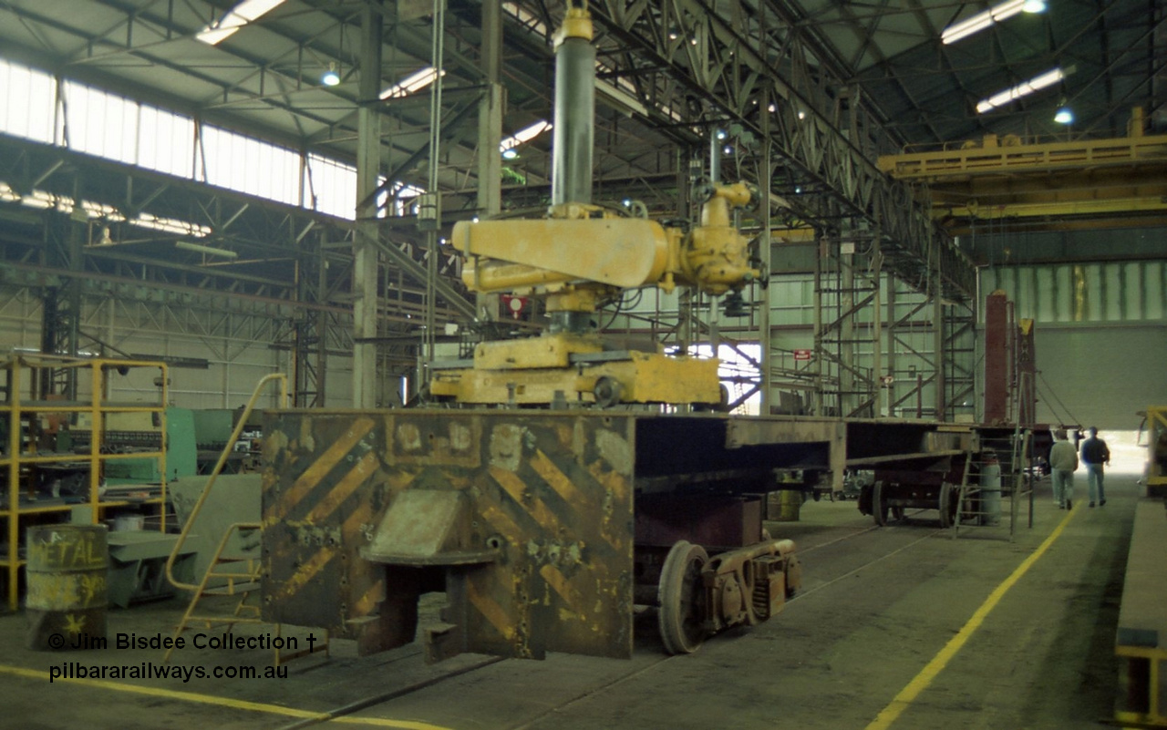 22657
Bassendean, during an Open Day at the Goninan workshops, a stripped back ALCo locomotive frame under re-construction which will become a GE CM40-8M. 20th July 1991.
Jim Bisdee photo.
