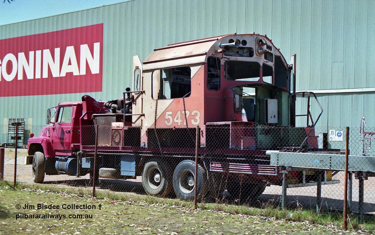 23714
Bassendean, Goninan workshops, Mt Newman Mining's AE Goodwin built ALCo model M636 unit 5473 serial G6047-5 being scrapped to frame level, cab section on truck. December 1992.
Jim Bisdee photo.
Keywords: 5473;AE-Goodwin;ALCo;M636C;G6047-5;
