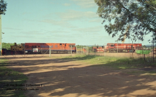 16947
Bassendean, an overview of the rear of Goninan's workshops, Westrail P class and Mt Newman Mining's AE Goodwin built ALCo M636 unit 5480 serial G6061-1 being prepped for rebuilding into 5658. October 1993.
Jim Bisdee photo.
Keywords: 5480;AE-Goodwin;ALCo;M636C;G6061-1;