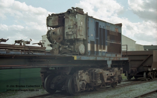 19799
Bassendean, Goninan workshops, former BHP Iron Ore Goninan GE rebuild C36-7M unit 5509, seen here stripped down to being an engine test bed, view of the radiator section with the lube filter and cooler visible on the no. 2 end. Sept 2003.
Jim Bisdee photo.
Keywords: 5509;Goninan;GE;C36-7M;4839-05/87-074;rebuild;AE-Goodwin;ALCo;C636;5452;G6012-1;