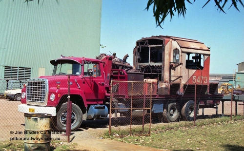 23713
Bassendean, Goninan workshops, Mt Newman Mining's AE Goodwin built ALCo model M636 unit 5473 serial G6047-5 being scrapped to frame level, cab section on truck. December 1992.
Jim Bisdee photo.
Keywords: 5473;AE-Goodwin;ALCo;M636C;G6047-5;