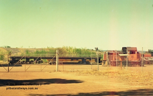 23761
Bassendean, Goninan workshops, a stripped back ALCo locomotive frame under re-construction which will become a GE CM40-8M and the ARHS former WAGR B class shunt engine. January 1993.
Jim Bisdee photo.

