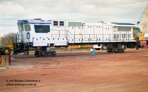 23878
Bassendean, Goninan workshops, an unidentified ALCo to GE CM40-8M rebuild unit, could be 5648. July 1993.
Jim Bisdee photo.
Keywords: Goninan;GE;CM40-8M;