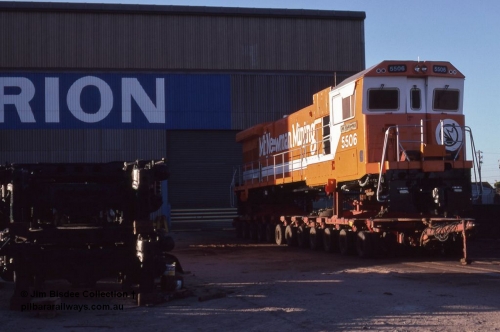 5947 001 Welshpool 1987Jan
Welshpool, Goninan workshops, freshly rebuilt and ready for delivery, Mt Newman Mining C36-7M locomotive 5506 serial 4839-01 / 87-071 sits on a road transport float awaiting delivery to Port Hedland, it was rebuilt using AE Goodwin built C636 ALCo 5455 serial G6012-4. January 1987.
Jim Bisdee photo.
Keywords: 5506;Goninan;GE;C36-7M;4839-01/87-071;rebuild;AE-Goodwin;ALCo;C636;5455;G6012-4;