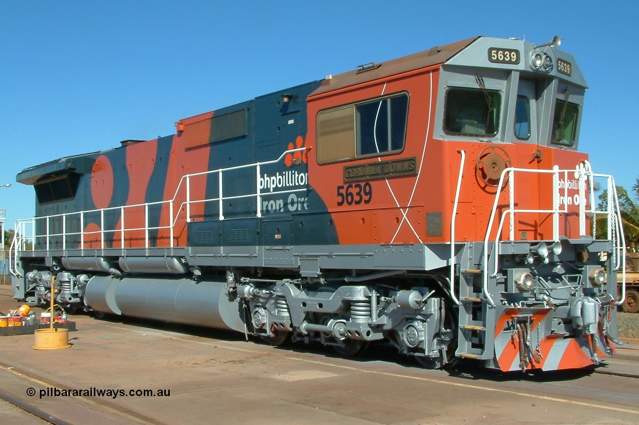 030720 160654r
Nelson Point Loco Service Shop, BHP Billiton Goninan GE rebuild CM40-8M 5639 'Corunna Downs' serial 8281-03 / 92-128 sits in the afternoon Pilbara sun displaying its brand new colours, painting only finished on it this day and about ten minutes after these photos where taken the unit was back in service! Sunday 20th July 2003.
Keywords: 5639;Goninan;GE;CM40-8M;8281-03/92-128;rebuild;AE-Goodwin;ALCo;C636;5459;G6027-3;