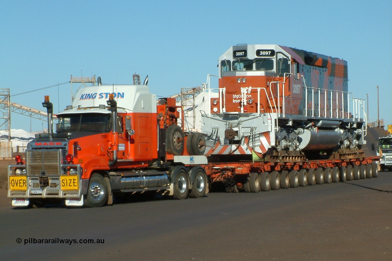 040807 082023r
Port Hedland, Gilbert Street, EMD SD40R unit 3097 serial 31569 and originally Southern Pacific SD40 SP 8409 is the final member of the SD40 units and is being road delivered by Kingston Heavy Haulage 7th August 2004.
Keywords: 3097;EMD;SD40R;31569/7875-10;SD40;SP8409;