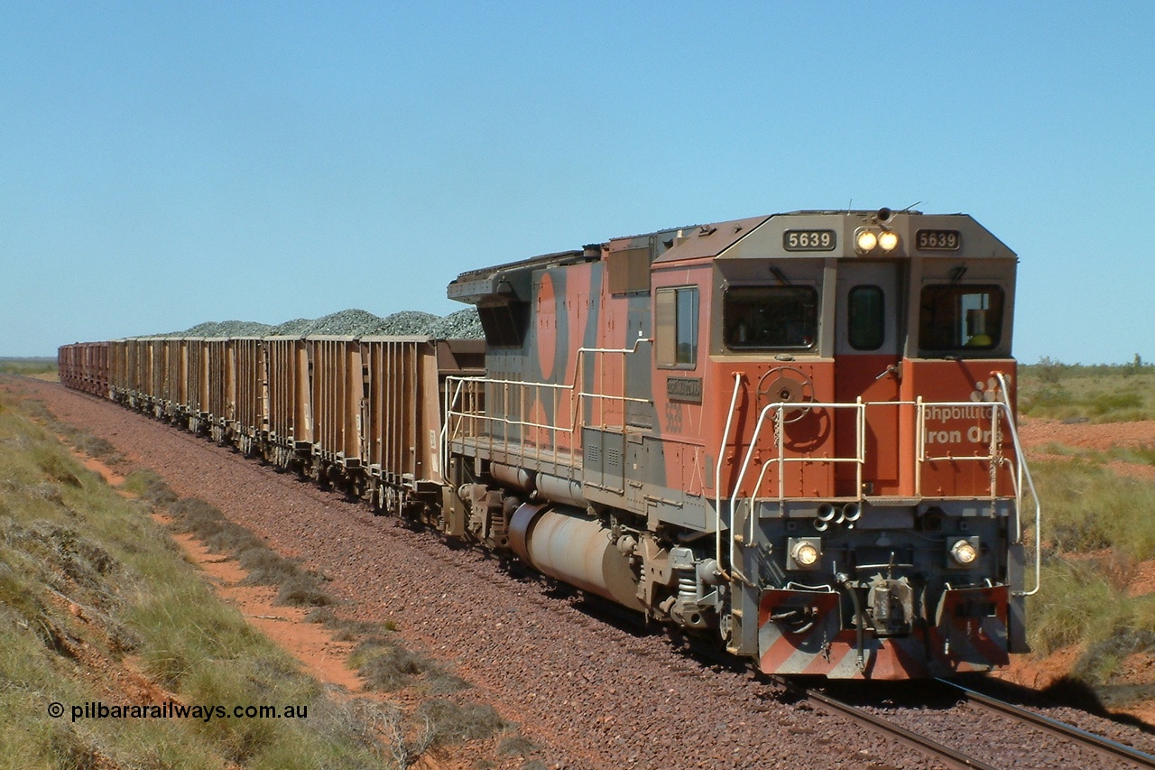 040812 123214r
Yarrie line 148 km, east of Taplin, BHP Billiton Goninan GE rebuild CM40-8M 5639 'Corunna Downs' serial 8281-03/92-128 works a 'mixed' of 12 ballast and 10 loaded GML waggons towards Hedland following a derailment further out near the Yarrie Mine, 1230 hrs 12th August 2004.
Keywords: 5639;Goninan;GE;CM40-8M;8281-03/92-128;rebuild;AE-Goodwin;ALCo;C636;5459;G6027-3;