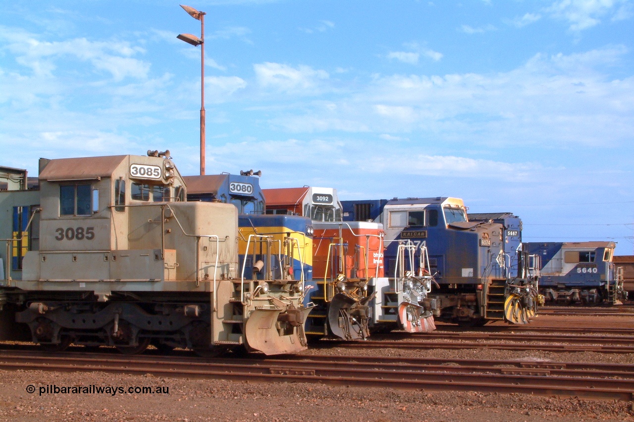 041119 162246r
Nelson Point, a Pilbara Power Parade line-up of (from l to r) of EMD SD40-2 3085, EMD SD40R 3080, 3092, GE AC6000 6074, Goninan GE CM40-8M 5667 and 5640. Seen out the front of the Locomotive Overhaul Shop on Friday 19th November 2004.
Keywords: 3085;EMD;SD40-2;786170-25;