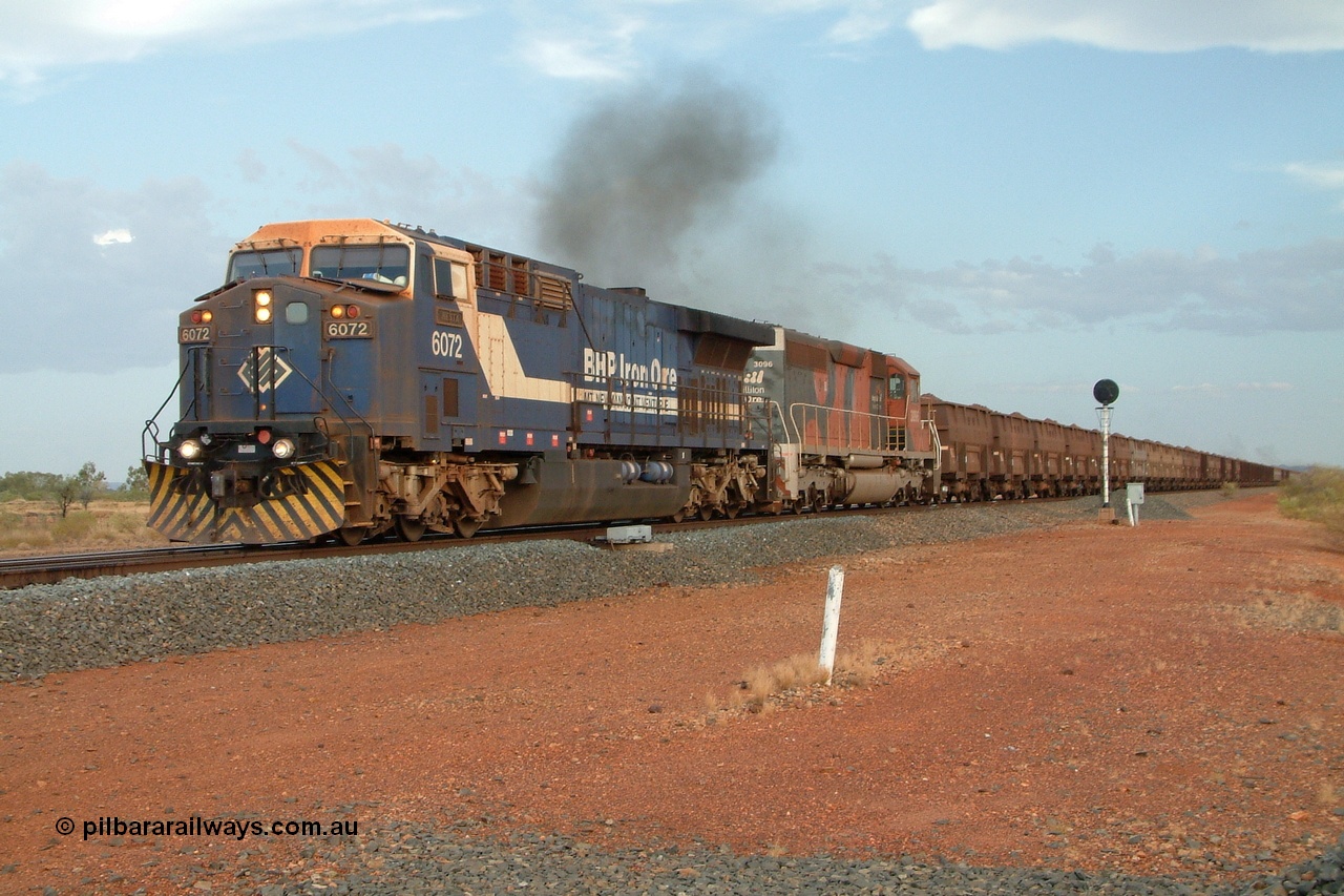 050130 171954r
Gillam Siding, BHP GE AC6000 6072 'Hesta' serial 51064 heads up a 300 waggon train with SD40R unit 3096 serial 31510 originally Southern Pacific SD40 SP 8429 power north away from Gillam 30th January 2005.
Keywords: 6072;GE;AC6000;51064;