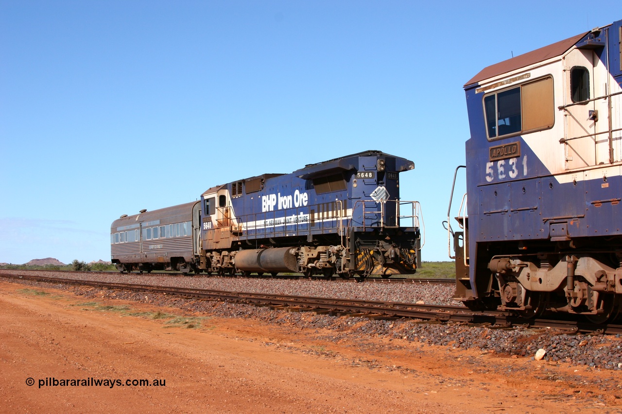 050625 3801
Allan Siding at the 46 km on the GML sees BHP Goninan GE rebuilt model CM40-8M unit 5648 'Kwangyang Bay' serial 8412-06 / 93-139 long end leading the Sundowner along the main as it crosses 5630 'Zeus' on an empty train refuged in the passing track while returning to Hedland 25th June 2005.
Keywords: 5648;Goninan;GE;CM40-8M;8412-06/93-139;rebuild;AE-Goodwin;ALCo;M636C;5477;G6047-9;