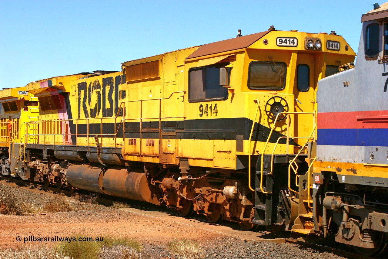 061209 8156r
Cape Lambert 11.7 km grade crossing, Robe River Goninan GE rebuilt CM40-8M loco 9414 serial 8206-11/91-124 still in service on the Deepdale line along with several others of the class in a quad lash up with three GE Dash 9-44CW units. 9th December 2006.
Keywords: 9414;Goninan;GE;CM40-8M;8206-11/91-124;rebuild;AE-Goodwin;ALCo;M636;G6060-5;