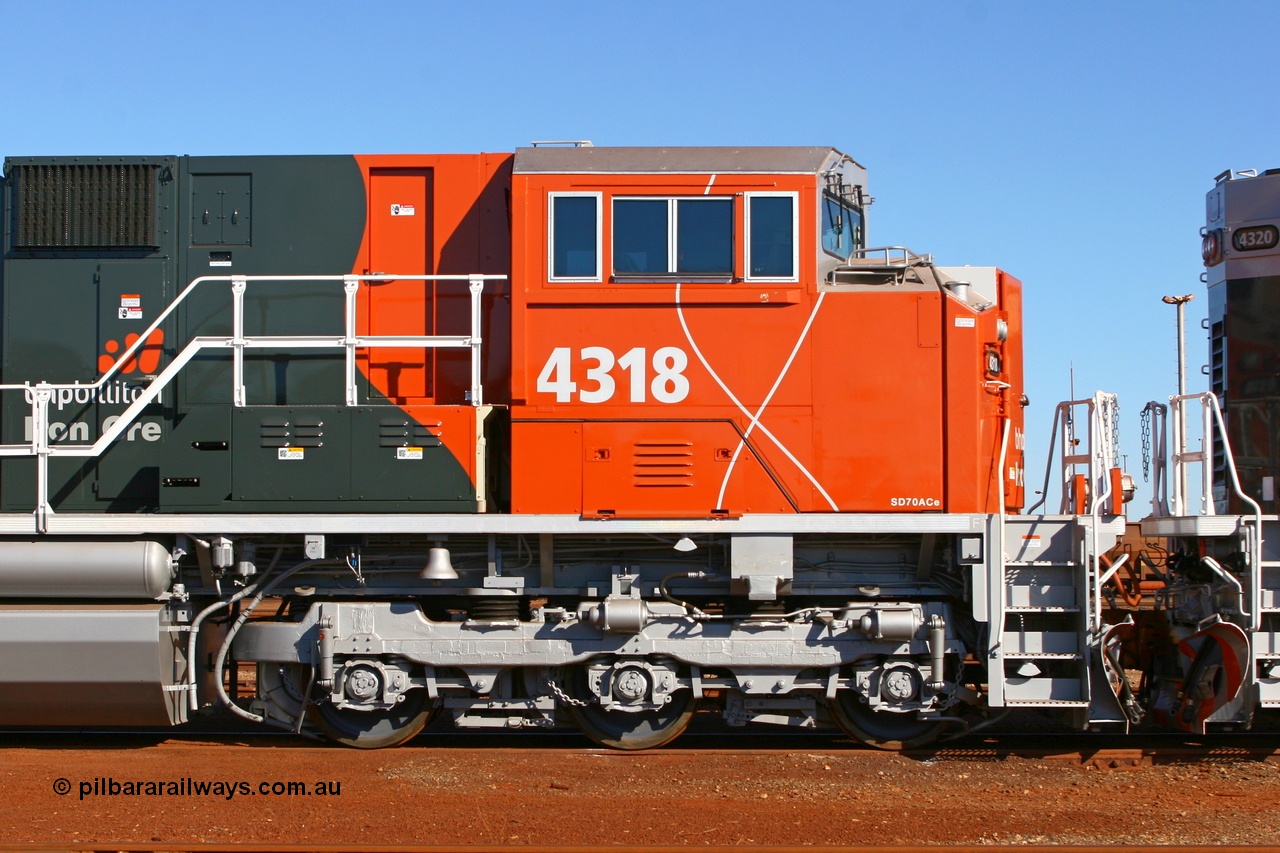 070415 8861
Nelson Point Locomotive Overhaul Workshop, right hand side view of BHP Billiton Electro-Motive built SD70ACe/LC loco 4318 serial 20058712-005 with isolated cab. Of note is the vertical sand filler on the nose compared to the original order, 15th April 2007.
Keywords: 4318;Electro-Motive;EMD;SD70ACe/LC;20058712-005;