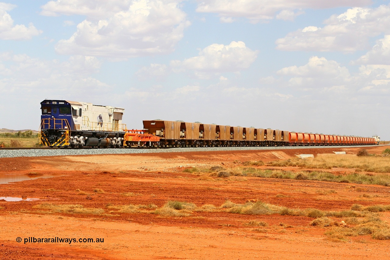 080120 1593r
Indee Road grade crossing, the afternoon ballast train makes its way south to the drop site having just crossed Indee Rd, 48.3 km. Comeng WA ALCo rebuild C636R loco DR 8404 'Vera' serial WA135 / C6040-01 with logos on the radiator, with DR 8403 on the lead. 20th January 2008.
Keywords: DR-class;DR8404;Comeng-WA;ALCo;C636R;WA135/C6040-1;