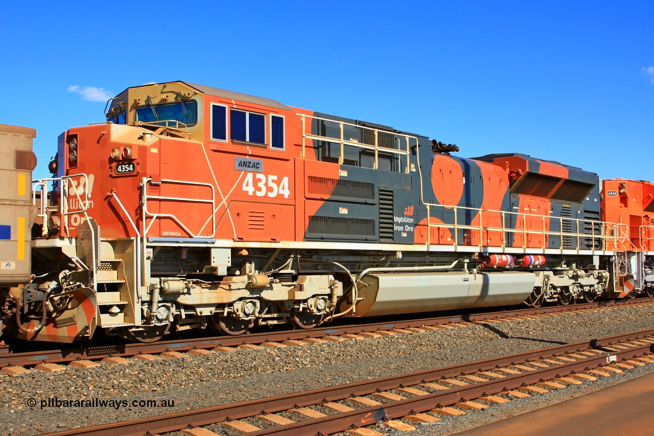 110208 9328r
Bing Siding, BHP Billiton's 4354 'ANZAC' an Electro-Motive built EMD SD70ACe unit with serial 20088019-008 from the fifth order of nine locos built in London Ontario. This image shows the ladder stirrups on the nose have been removed and there has been a trial set of sliding gates fitted to the gate to prevent a fall from heights when the step well plate is installed. This style of handrail didn't last long. 8th February 2011.
Keywords: 4354;Electro-Motive-London-Ontario;EMD;SD70ACe;20088019-008;