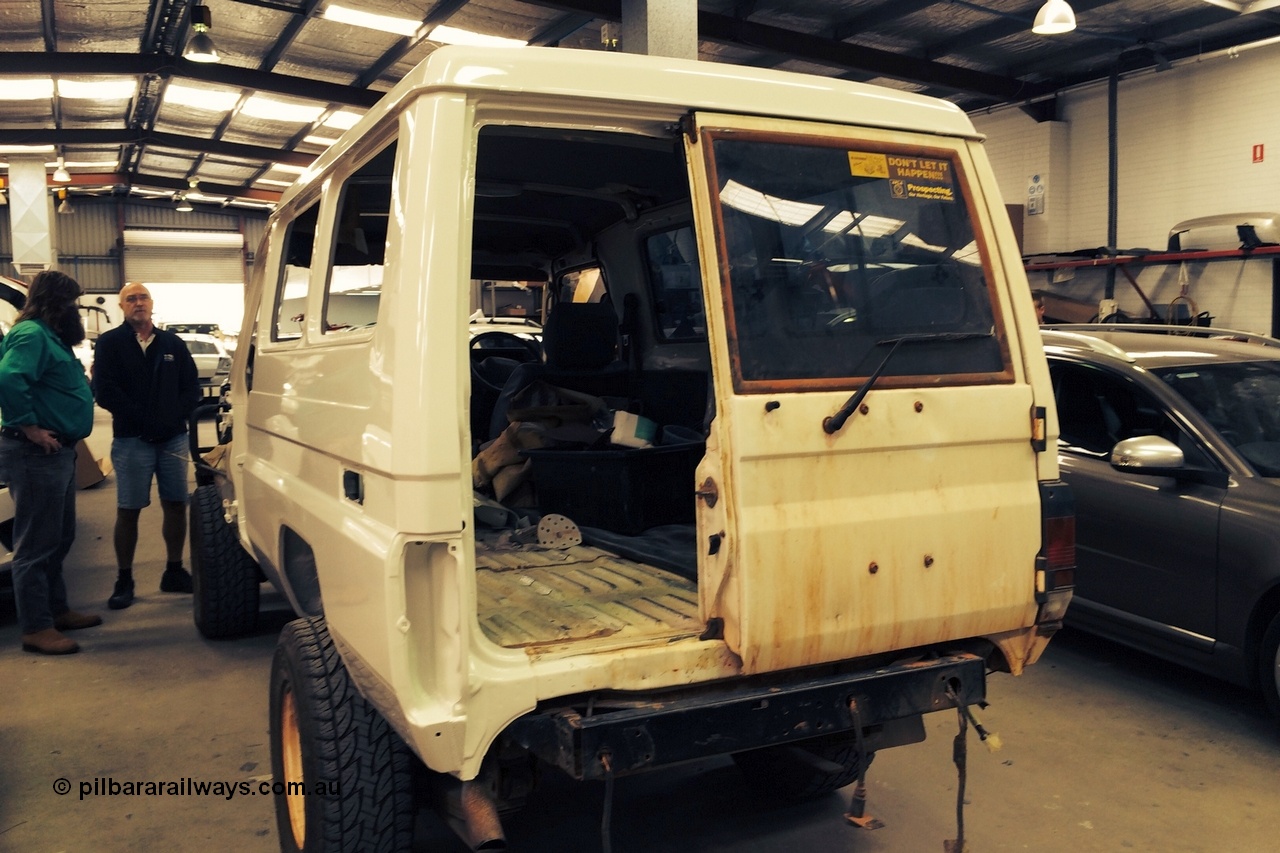 140603 0699r
Here's the Troopy at the panel shop with a complete new LHS panel viewed from the back, I'm talking to Keith from the panel shop. June 2014.
