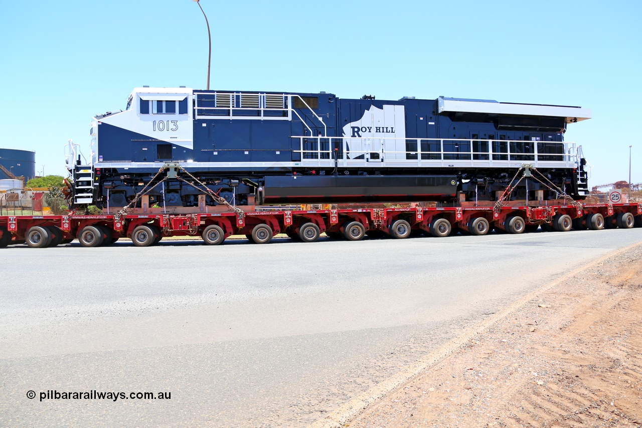 150129 7450
Port Hedland, Roy Hill's General Electric built ES44ACi unit RHA 1013 serial 62585 is their first locomotive to be delivered off the vessel Ocean Charger and being transported by ALE to Roy Hill's flash butt yard. Seen here leaving the Port Hedland port. 29th January 2015.
Keywords: RHA-class;RHA1013;GE;ES44ACi;62585;