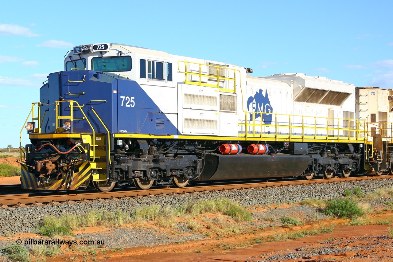 200410 5143r
Boodarie, FMG's Electro-Motive Diesel built SD70ACe-P6 locomotive 725 serial 20188761-004 built 2019, delivered February 2020. This order for ten units are standard US 'domestic' models with the 16-710G3C-T3 at 4500 horsepower and one inverter per axle hence the '-P6' and were fitted with the extra handrails and other refinements like the fire suppressant tanks and bifurcated air pipe here in Port Hedland, other points of difference include only one cow plough on short hood end, ditch lights on both ends, standard US air horn and no marker lights. 10th April 2020.
Keywords: FMG-725;Progress-Rail-Muncie-USA;EMD;SD70ACe-P6;20188761-004;