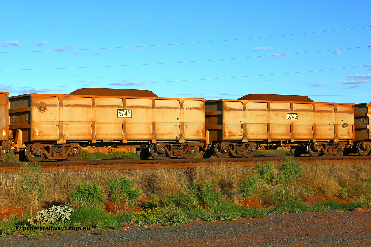 5745-6746 210321 9302
FMG 5745 and 6746 at Boodarie on a loaded train, March 21, 2021. Two waggons 5745 slave and 6746 control are prototypes built by CRRC Yangtze.
