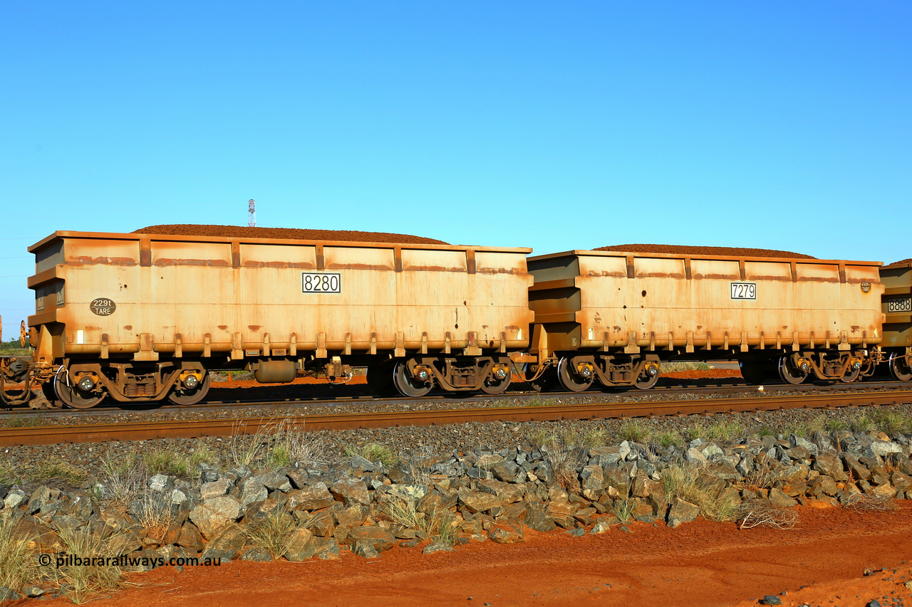 7279-8280 220512 3758
FMG 7279 and 8280 on a loaded train at Boodarie, May 12, 2022. 140 waggons numbered from 7279 slave and 8280 control, up to 7417 slave and 8418 control built by CSR Yangtze in 2014 with a new ribbed body style.
