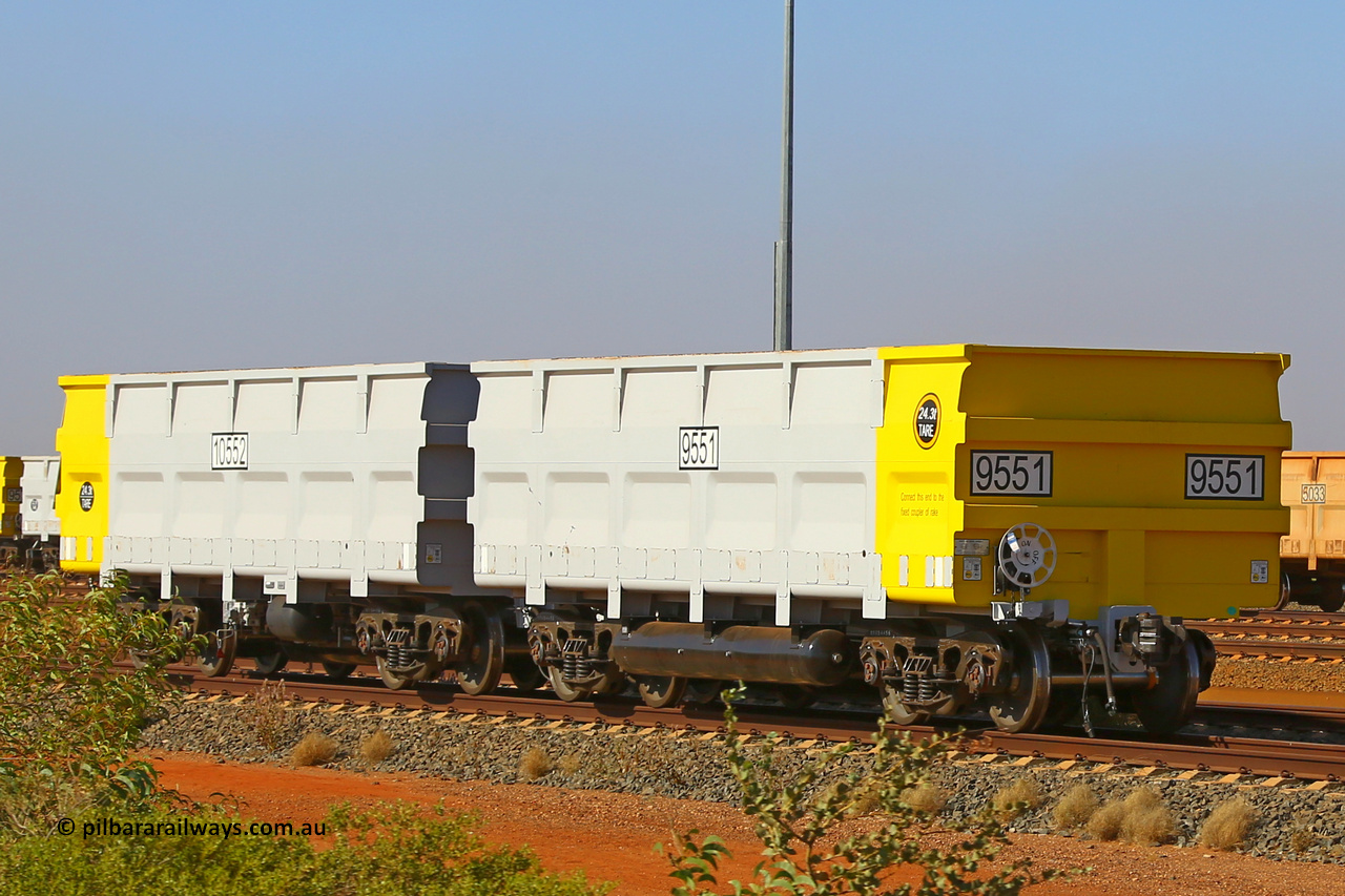9551-10552 211128 2899
FMG 9551 and 10552 in Thomas Yard, November 28, 2021 with tanks as a booster waggon trial. Twenty pairs, or forty waggons numbered 9551 slave and 10552 control, up to 9589 slave and 10590 control built by CRRC Qiqihar in 2021 with the CNR style body and yellow ends denoting dual rotary coupler waggons.
