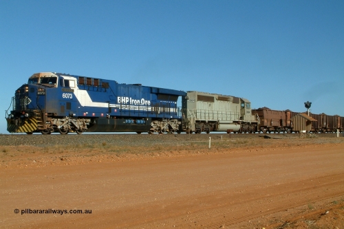 040802 155428r
Bing Siding, BHP GE AC6000 locomotive 6073 'Fortescue' leads EMD SD40-2 unit 3084 serial 786263-35 originally Union Pacific UP 3643 with a loaded train running through Bing 2nd August 2004.
Keywords: 6073;GE;AC6000CW;51065;