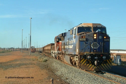 040809 162852r
Nelson Point, BHP GE AC6000 6075 'Newman' serial 51067 and EMD SD40R 3090 serial 33680 originally Southern Pacific SD40 SP 8488 depart the yard with the 1630 hrs departure on 9th August 2004. The mid-train units 5660 and 5656 can be just seen in picture.
Keywords: 6075;GE;AC6000CW;51067;