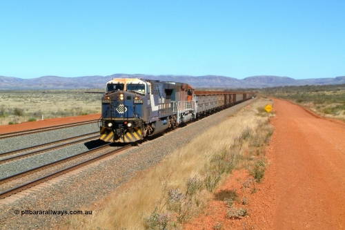040810 123248r
Cowra Siding, BHP GE AC6000 6074 'Kalgan' serial 51066 leading EMD SD40R 3088 serial 31513 originally Southern Pacific SD40 SP 8432 with a loaded train through the mainline at the newly reinstated siding of Cowra, located at the 249 km 10th August 2004.
Keywords: 6074;GE;AC6000;51066;