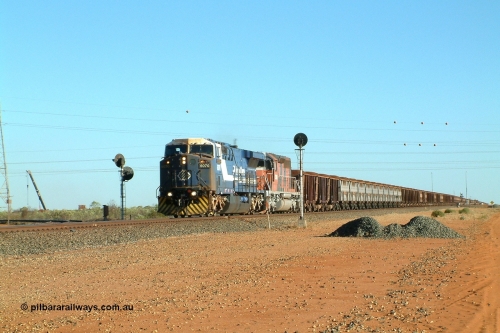 040811 161635r
Goldsworthy Junction, BHP GE AC6000 class leader 6070 'Port Hedland' serial 51062 runs through the junction leading EMD model SD40R unit 3089 serial 31512 formally Southern Pacific SD40 SP 8431 with a loaded Yandi train 11th August 2004.
Keywords: 6070;GE;AC6000CW;51062;
