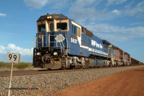 050101 170643r
Gillam Siding BHP Goninan GE rebuild CM40-8M 5637 'De Grey' serial 8181-01 / 92-123 leading a pair of EMD SD40R units 3087 and 3091 comes to a stand under the control of driver Jacka Cale behind another train already holding the main and an empty taking the passing track. Double crosses were not that uncommon during this era. 1st January 2005.
Keywords: 5637;Goninan;GE;CM40-8M;8181-01/92-123;rebuild;AE-Goodwin;ALCo;C636;5456;G6012-5;