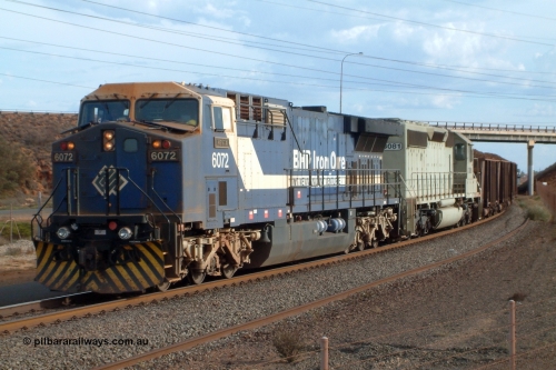 050102 170134r
Nelson Point, BHP GE AC6000 6072 'Hesta' serial 51064 leads EMD SD40-2 unit 3081 serial 786170-75 originally Union Pacific unit UP 3573 under the Redbank Bridge with their loaded train arriving into Nelson Point Yard 2nd January 2005.
Keywords: 6072;GE;AC6000;51064;