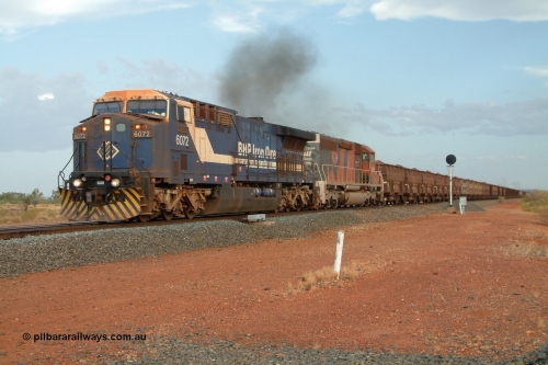 050130 171954r
Gillam Siding, BHP GE AC6000 6072 'Hesta' serial 51064 heads up a 300 waggon train with SD40R unit 3096 serial 31510 originally Southern Pacific SD40 SP 8429 power north away from Gillam 30th January 2005.
Keywords: 6072;GE;AC6000CW;51064;