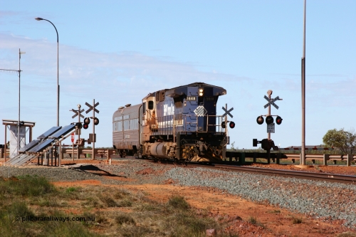 050625 3768
Broome Rd grade crossing at the 57.1 km on the GML sees BHP Goninan GE rebuilt model CM40-8M unit 5648 'Kwangyang Bay' serial 8412-06 / 93-139 long end leading the Sundowner on its way back to Hedland across the highway 25th June 2005.
Keywords: 5648;Goninan;GE;CM40-8M;8412-06/93-139;rebuild;AE-Goodwin;ALCo;M636C;5477;G6047-9;