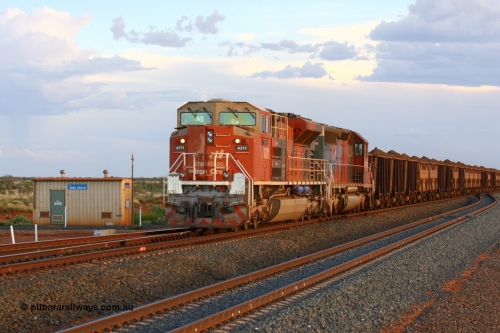060216 2792r
Bing Siding, BHP Billiton Electro-Motive built SD70ACe unit 4311 'Poonda' serial 20038540-012 with an SD40R as second unit runs through Bing South on the mainline to Nelson Point with a loaded trains. The track in the foreground is the new duplicated road to Nelson Point and is still under construction. 16th February 2006.
Keywords: 4311;Electro-Motive-London-Ontario;EMD;SD70ACe/LC;20038540-012;